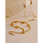 Conjunto de Colar e Pulseira com Flores Banhada a Ouro