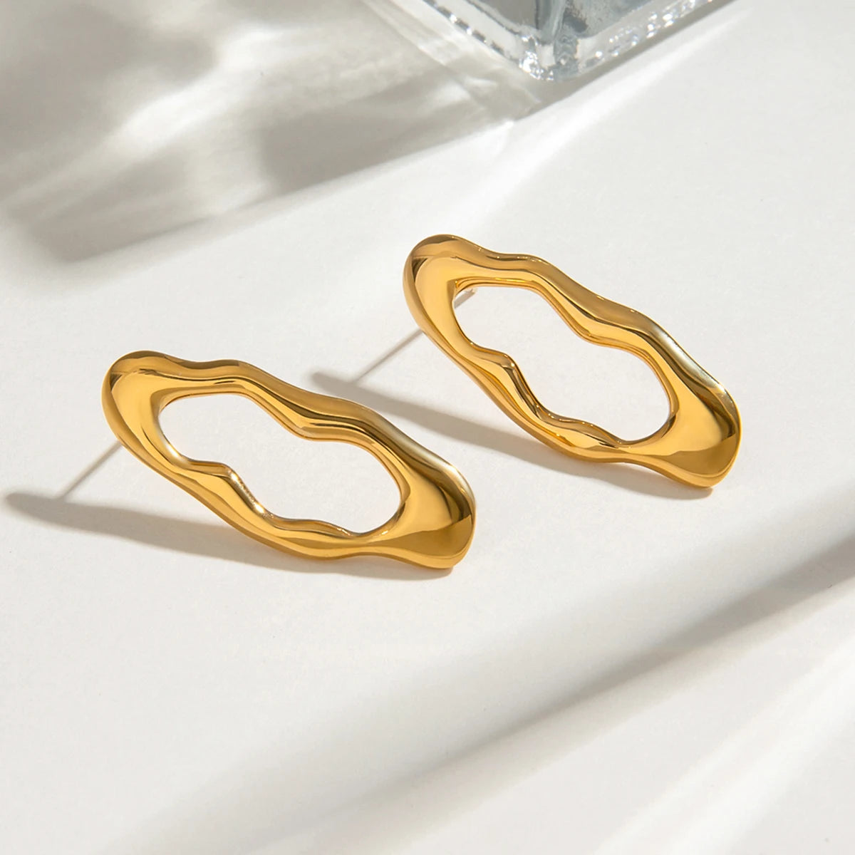 Brinco Forma de Lava Banhado a Ouro 18k
