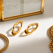 Brinco Forma de Lava Banhado a Ouro 18k