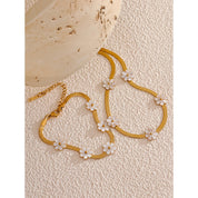 Conjunto de Colar e Pulseira com Flores Banhada a Ouro